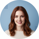 Portrait of Lily Evans, a woman with a warm smile, against a soft sky blue background.